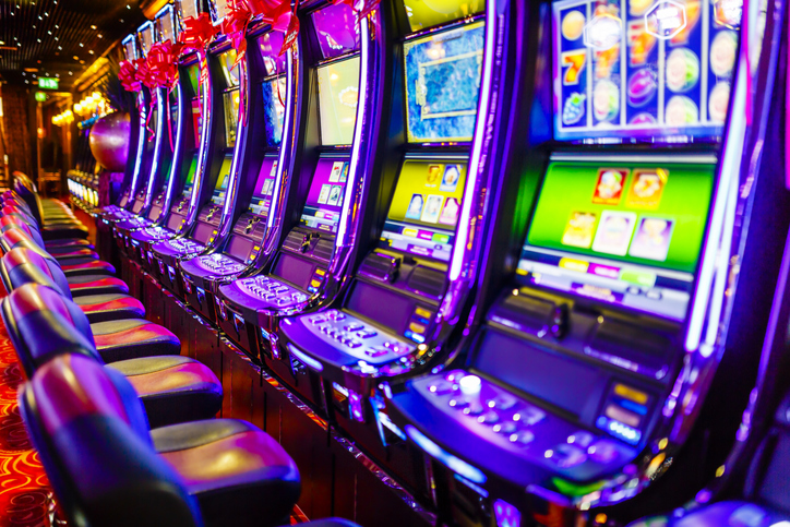 Row of electronic slot machines at a casino